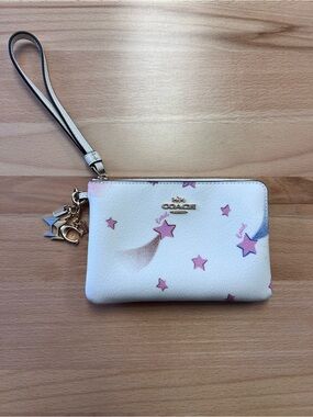 COACH White Wristlet with Pink Star Print and Gold Charm